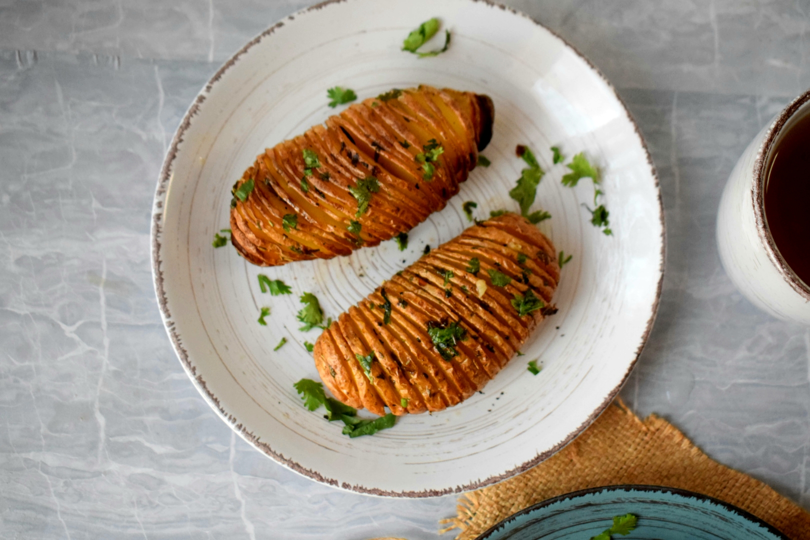 Cheesy Hasselback Potato